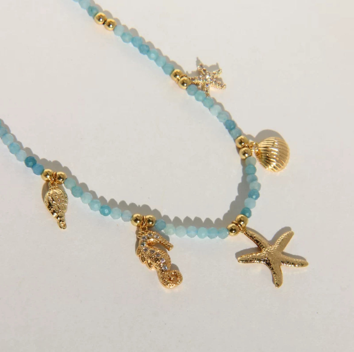 Gold plated sea blue necklace